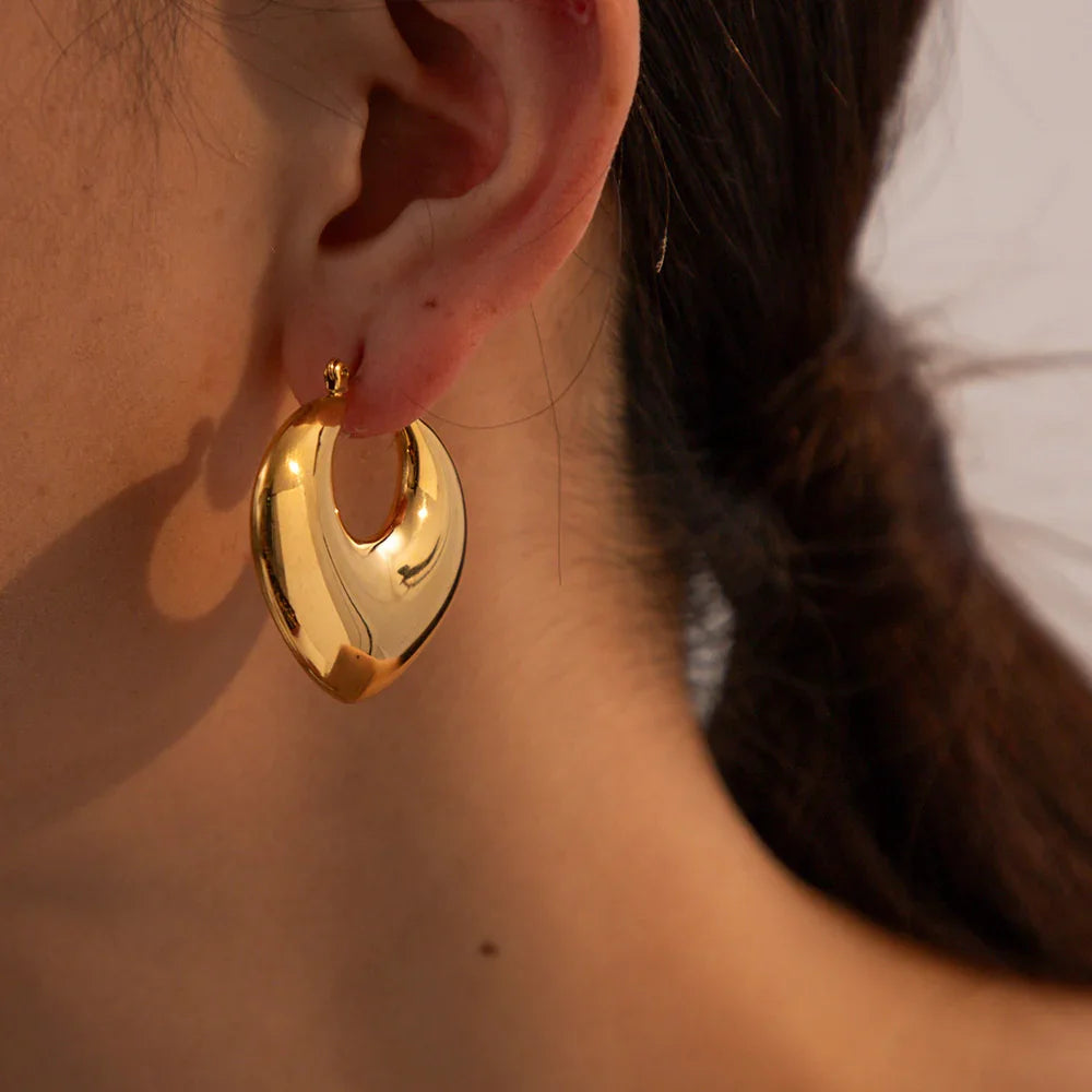 Gold-Plated Hoop Earrings with Sculptural Spade Circle Design