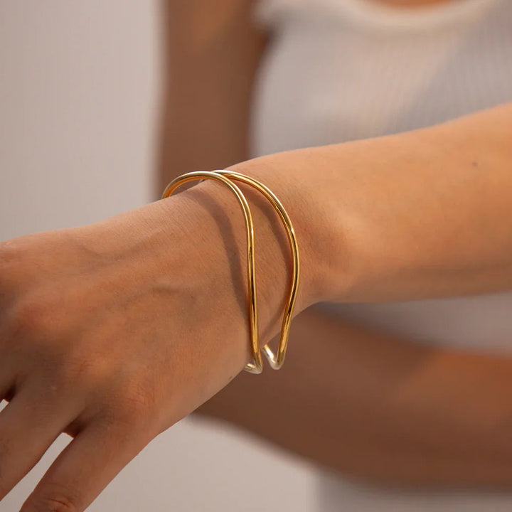 Gold-Plated Open Cuff Bracelet with Intertwining Design