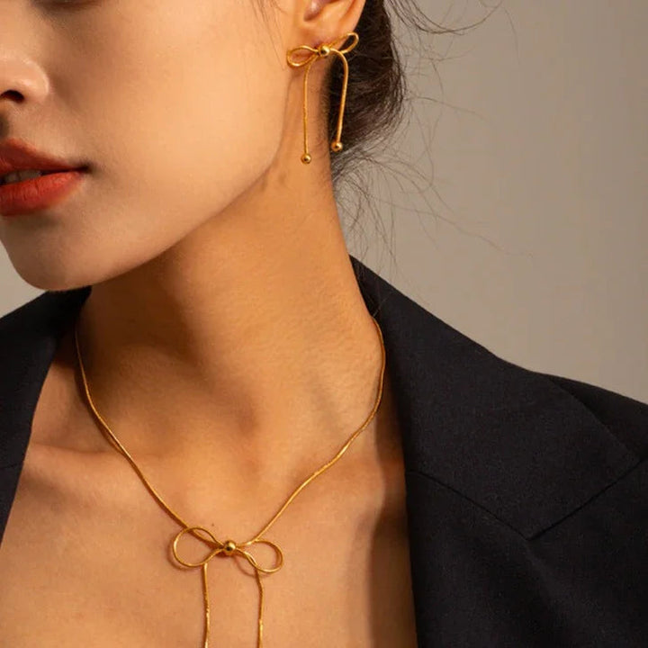 Gold-Plated Ribbon Drop Earrings with Elegant Design