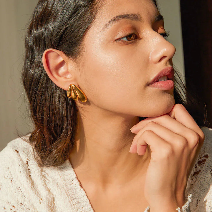 Gold-Plated Angel Wing Earrings with Divine Curves