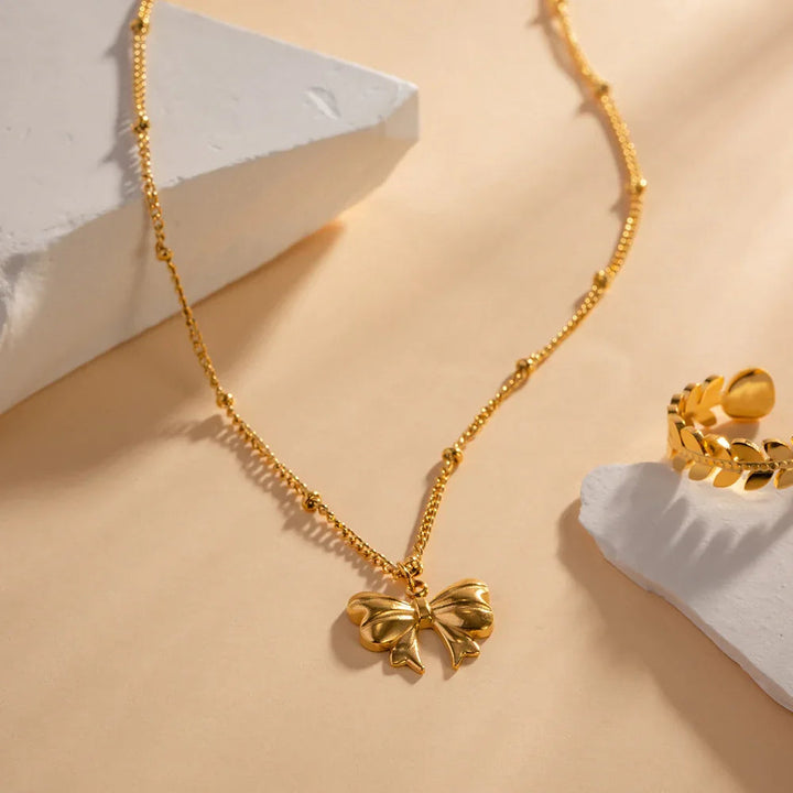 Gold-Plated Ribbon Necklace with Butterfly Pendant